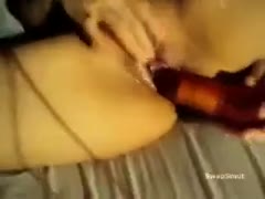 Rubbing one off with a busty milf while putting a very wet dildo inside